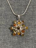 Multicoloured Amber Seed Explosion Pendant