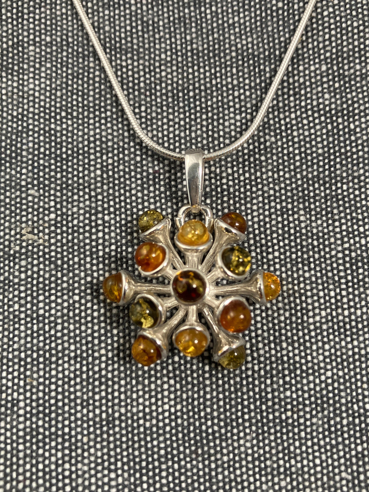 Multicoloured Amber Seed Explosion Pendant