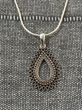 Ornate Jali Pear Pendant
