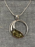 Green Amber Oval In Circle Pendant
