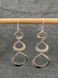 3 Pouch Swinging Earrings