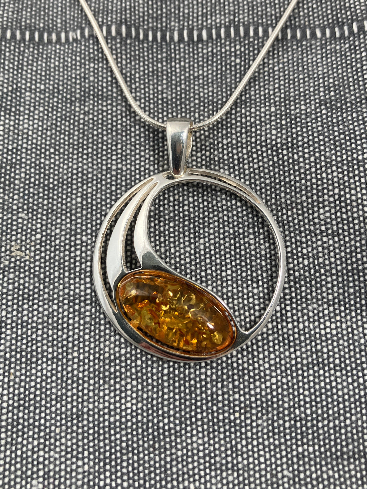 Amber Oval In Circle Pendant